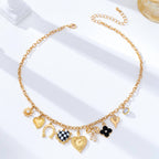 Gold & Black Multi-Charm Necklace