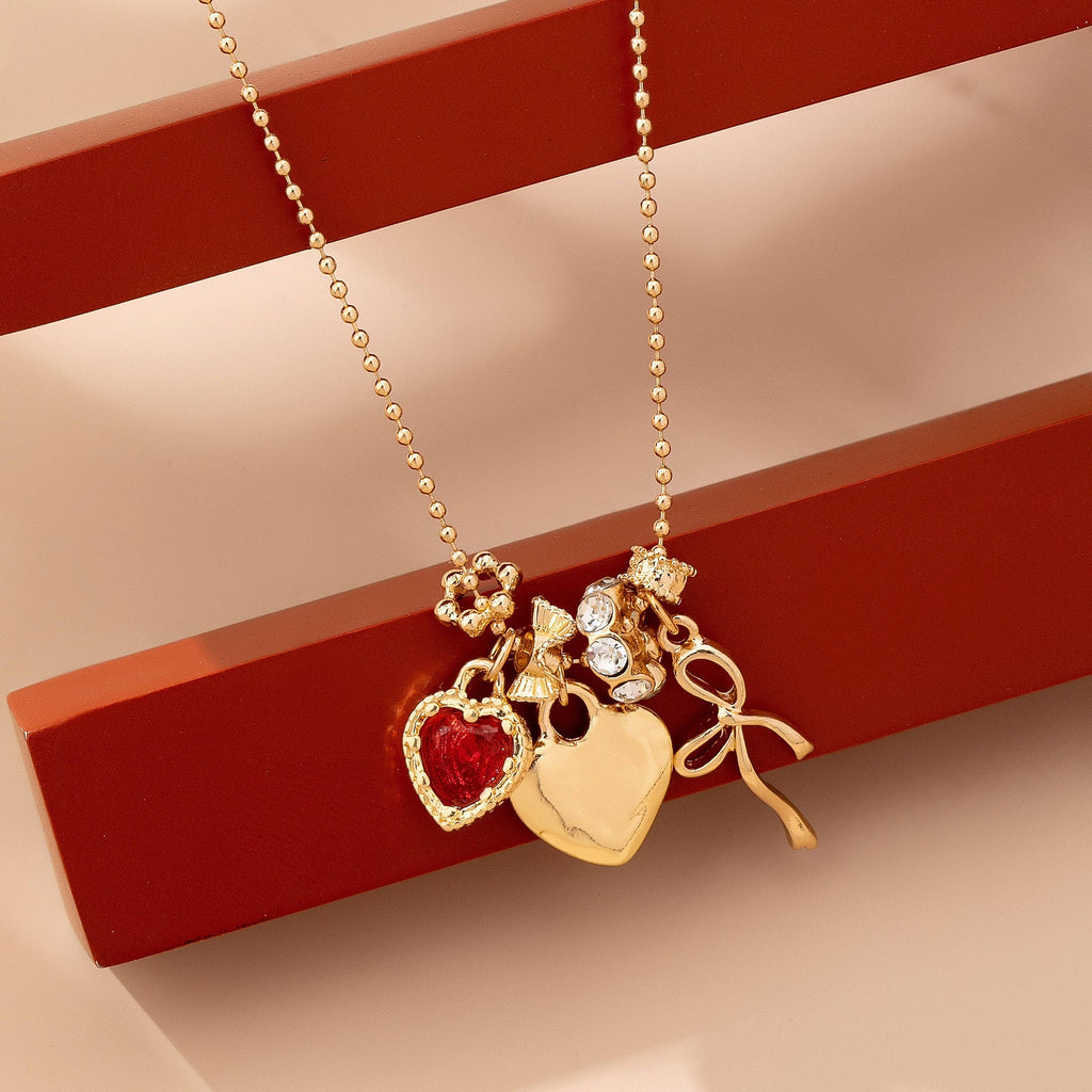 Multi-Charm Heart and Bow Necklace