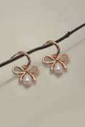 Bow Pearl Huggie Earrings