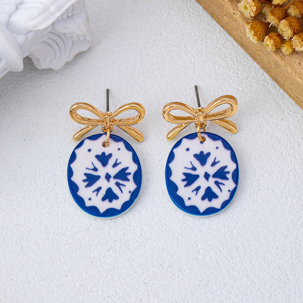 Gold Bow Drop Charm Earrings