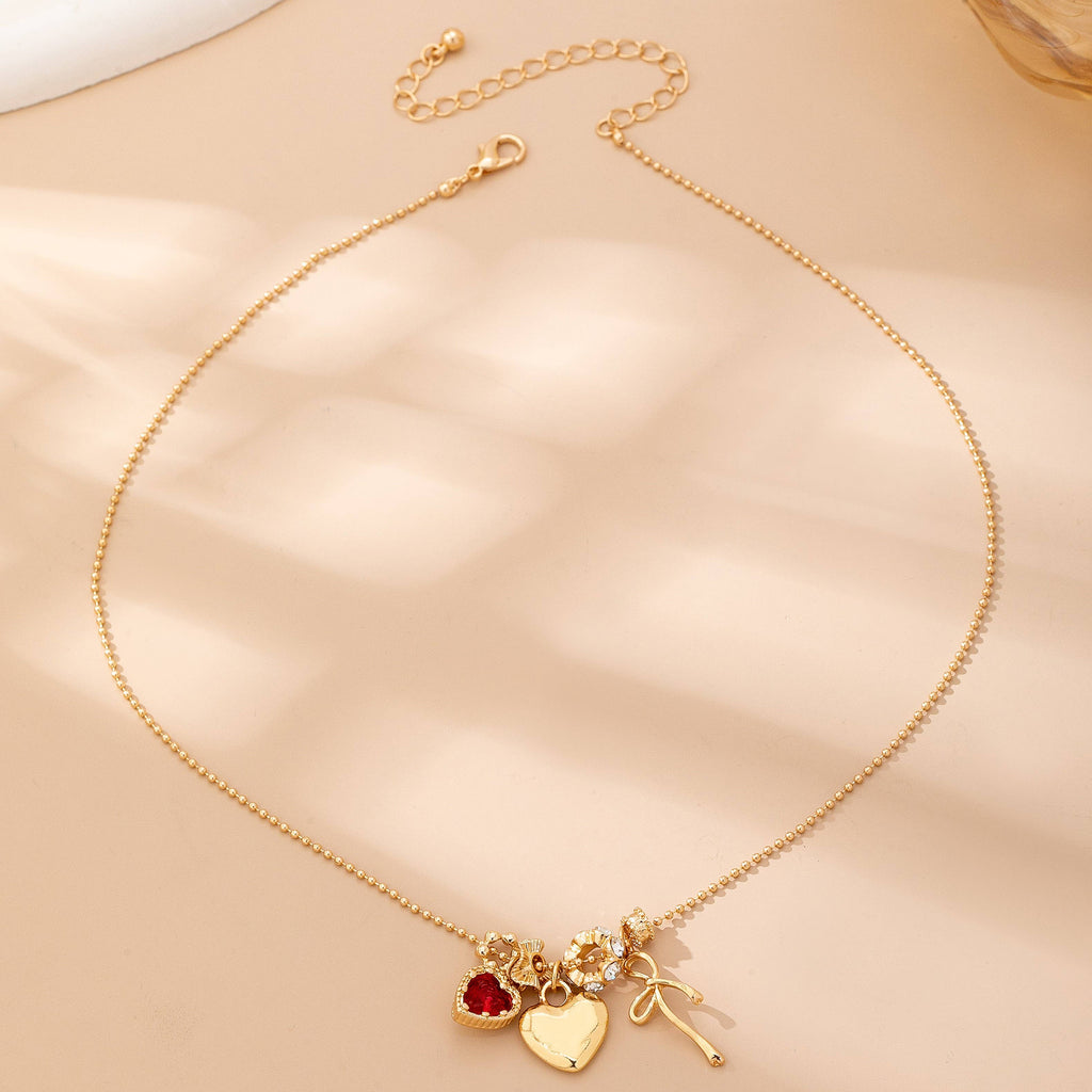 Multi-Charm Heart and Bow Necklace