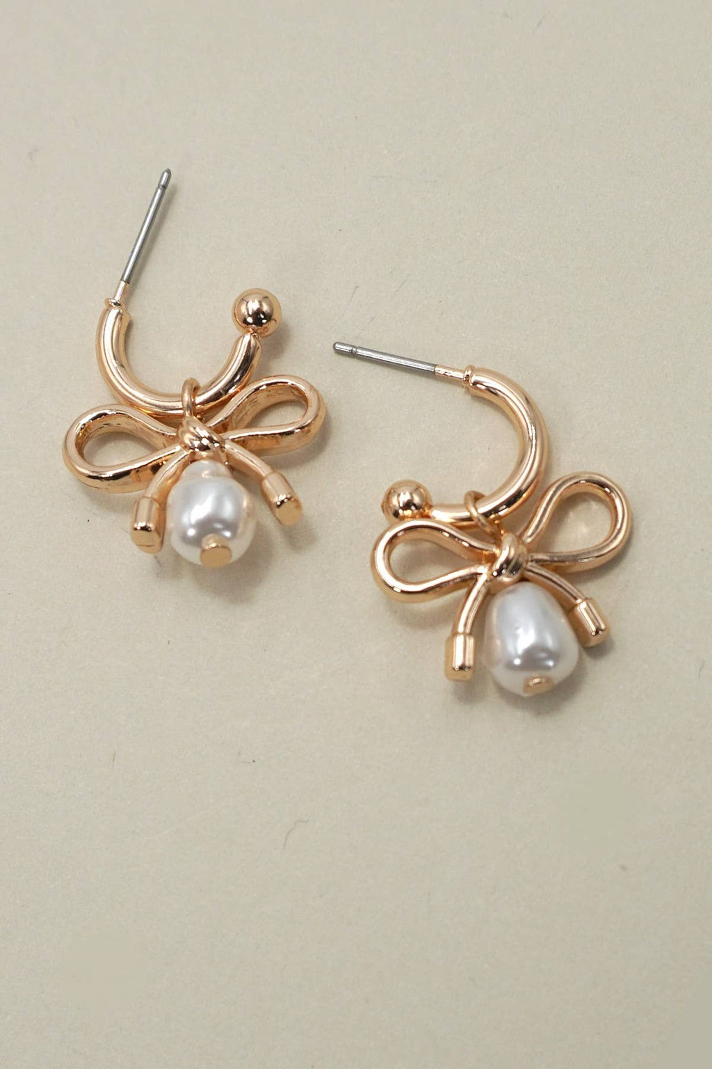 Bow Pearl Huggie Earrings