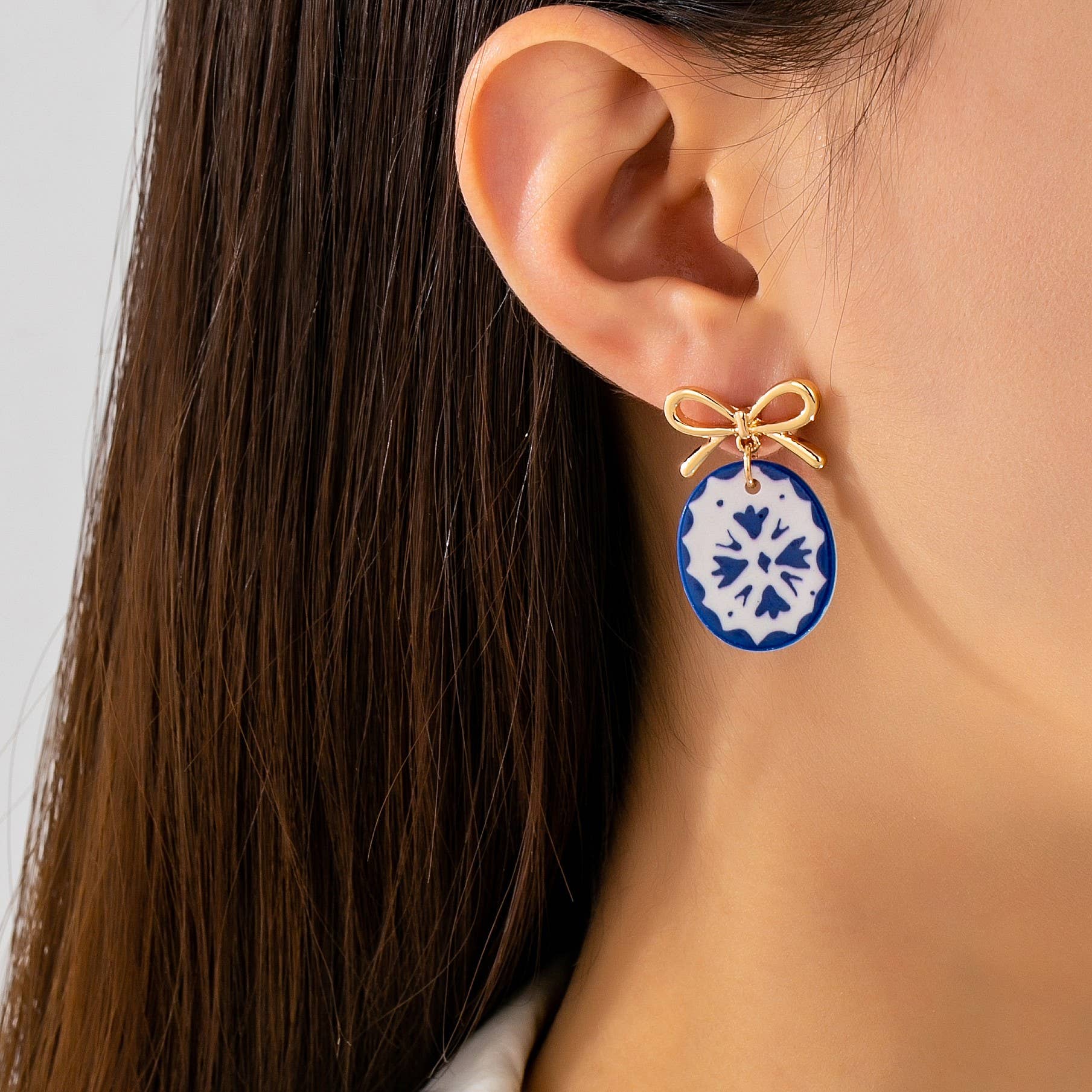 Gold Bow Drop Charm Earrings